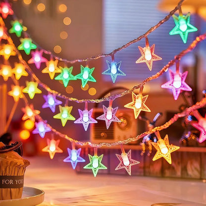 Multi-color LED star fairy string lights powered by batteries, perfect for adding a whimsical touch to any indoor or outdoor space. 3