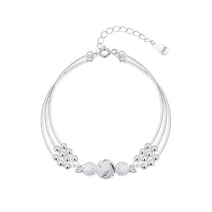 Sterling silver adjustable bracelet featuring symbolic charms for luck, measuring 20cm in length. 4
