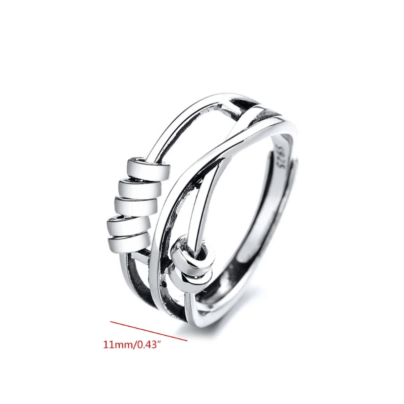 Sterling silver spinable anti-anxiety ring featuring an elegant design, adjustable size, and stress relief benefits, perfect for everyday wear. 3