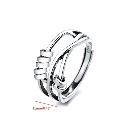 Sterling silver spinable anti-anxiety ring featuring an elegant design, adjustable size, and stress relief benefits, perfect for everyday wear. 3