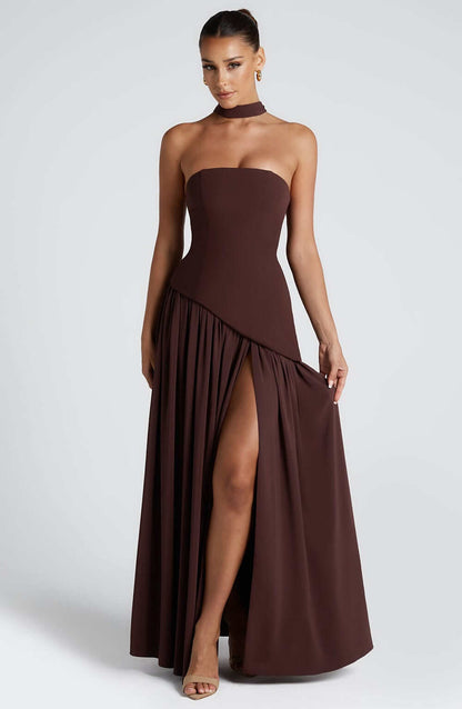 Strapless corset maxi gown featuring an asymmetrical draped skirt, perfect for elegant evening events and formal weddings. 1