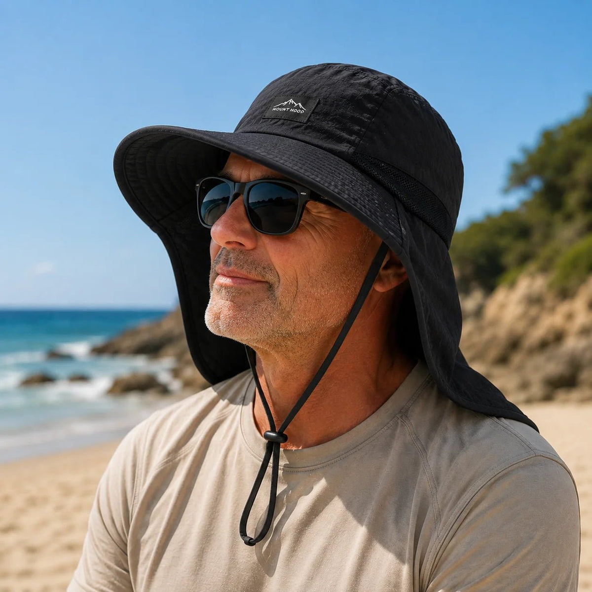 Sun hat with wide brim and neck flap, made of breathable nylon, offering UPF 50+ sun protection for outdoor activities. 8