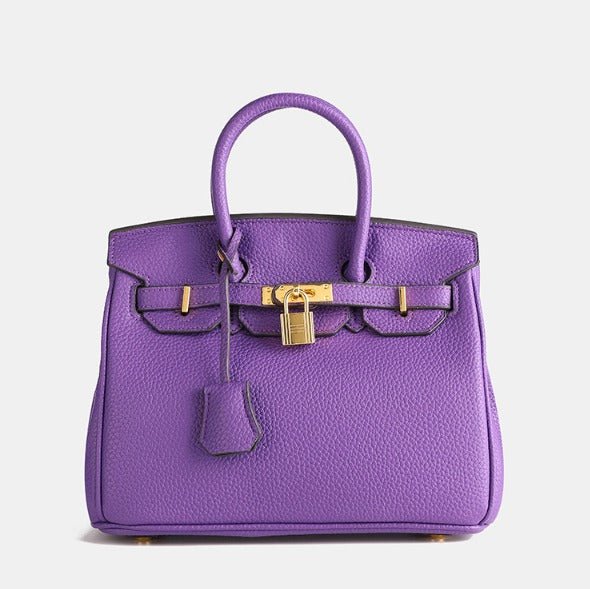 Synthetic leather handbag featuring a spacious interior and elegant design, perfect for organizing essentials for work and travel. 11