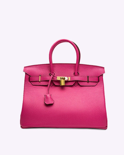 Synthetic leather handbag featuring a spacious interior and elegant design, perfect for organizing essentials for work and travel. 10