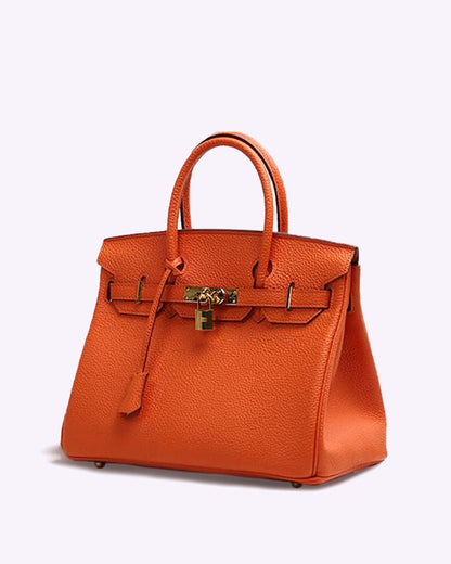 Synthetic leather handbag featuring a spacious interior and elegant design, perfect for organizing essentials for work and travel. 9