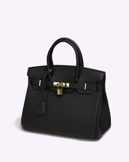 Synthetic leather handbag featuring a spacious interior and elegant design, perfect for organizing essentials for work and travel. 5