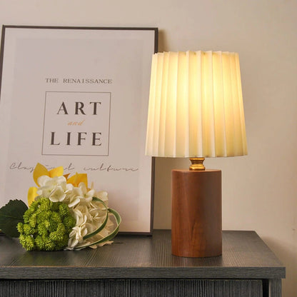 Table lamp featuring a vintage solid wood base, pleated shade, and dual USB/plug-in option, perfect for enhancing bedroom or nightstand decor. 1