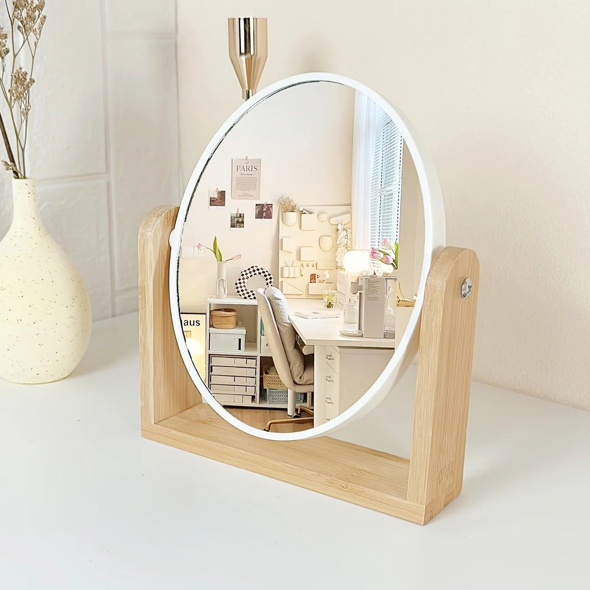 Tabletop makeup mirror featuring a double-sided rotating design with a magnifying side, elegantly framed in natural bamboo, perfect for a stylish vanity setup. 5