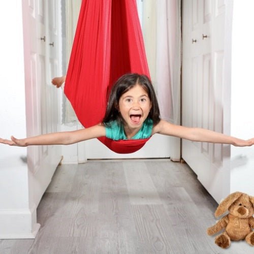 Therapeutic sensory swing for children designed to support focus and provide a calming experience, featuring easy assembly and durable materials. 5