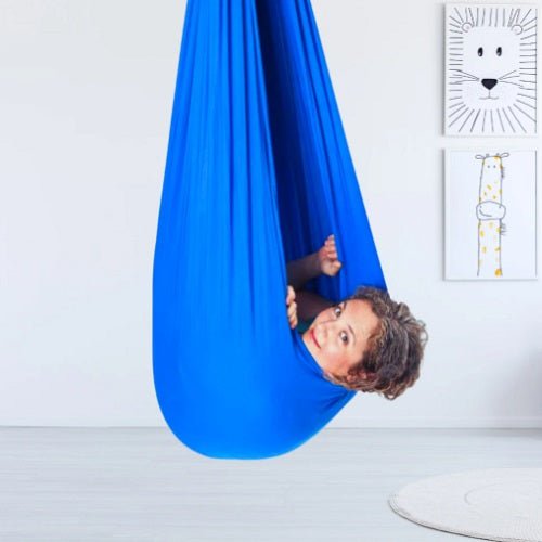 Therapeutic sensory swing for children designed to support focus and provide a calming experience, featuring easy assembly and durable materials. 2