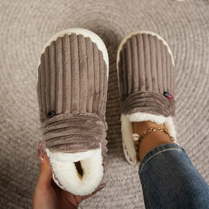 Cozy thermal women's slippers featuring a non-slip sole and insulating interior, perfect for keeping feet warm and comfortable at home. 9