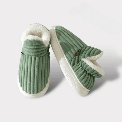 Cozy thermal women's slippers featuring a non-slip sole and insulating interior, perfect for keeping feet warm and comfortable at home. 7