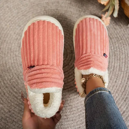 Cozy thermal women's slippers featuring a non-slip sole and insulating interior, perfect for keeping feet warm and comfortable at home. 12