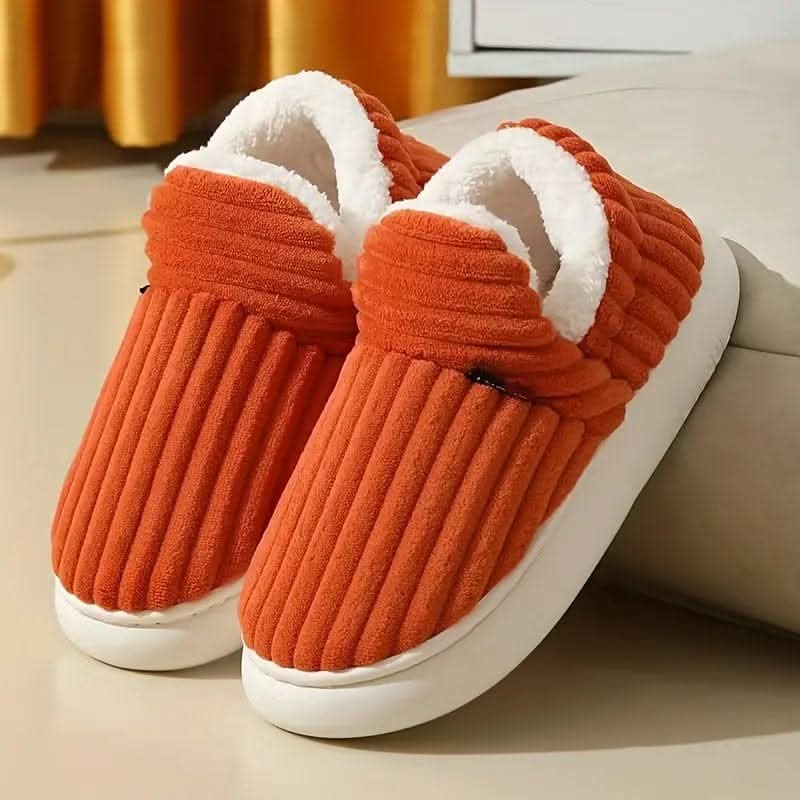 Cozy thermal women's slippers featuring a non-slip sole and insulating interior, perfect for keeping feet warm and comfortable at home. 11