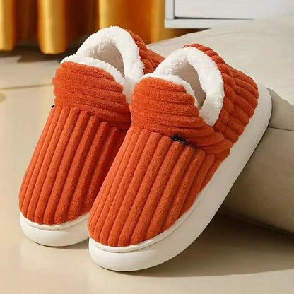 Cozy thermal women's slippers featuring a non-slip sole and insulating interior, perfect for keeping feet warm and comfortable at home. 11