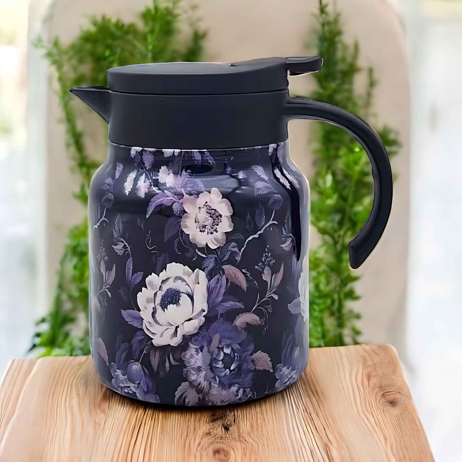 Thermos with infuser for hot tea, made of stainless steel, featuring a spill-resistant design and travel-friendly portability. 4