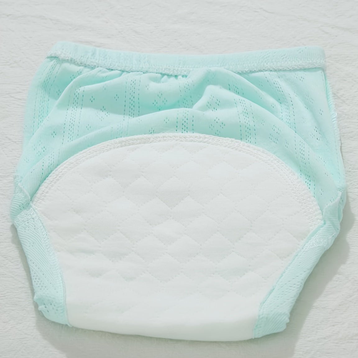 Toddler training pants with leakproof lining made from soft, reusable cotton, designed for comfortable potty training and easy transitions for toddlers. 3