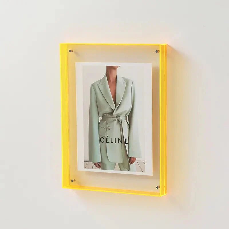 Transparent acrylic photo frame showcasing a floating design, perfect for minimalist display of photos and prints. 10