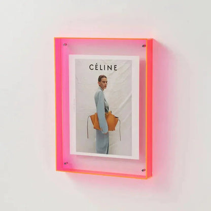 Transparent acrylic photo frame showcasing a floating design, perfect for minimalist display of photos and prints. 12