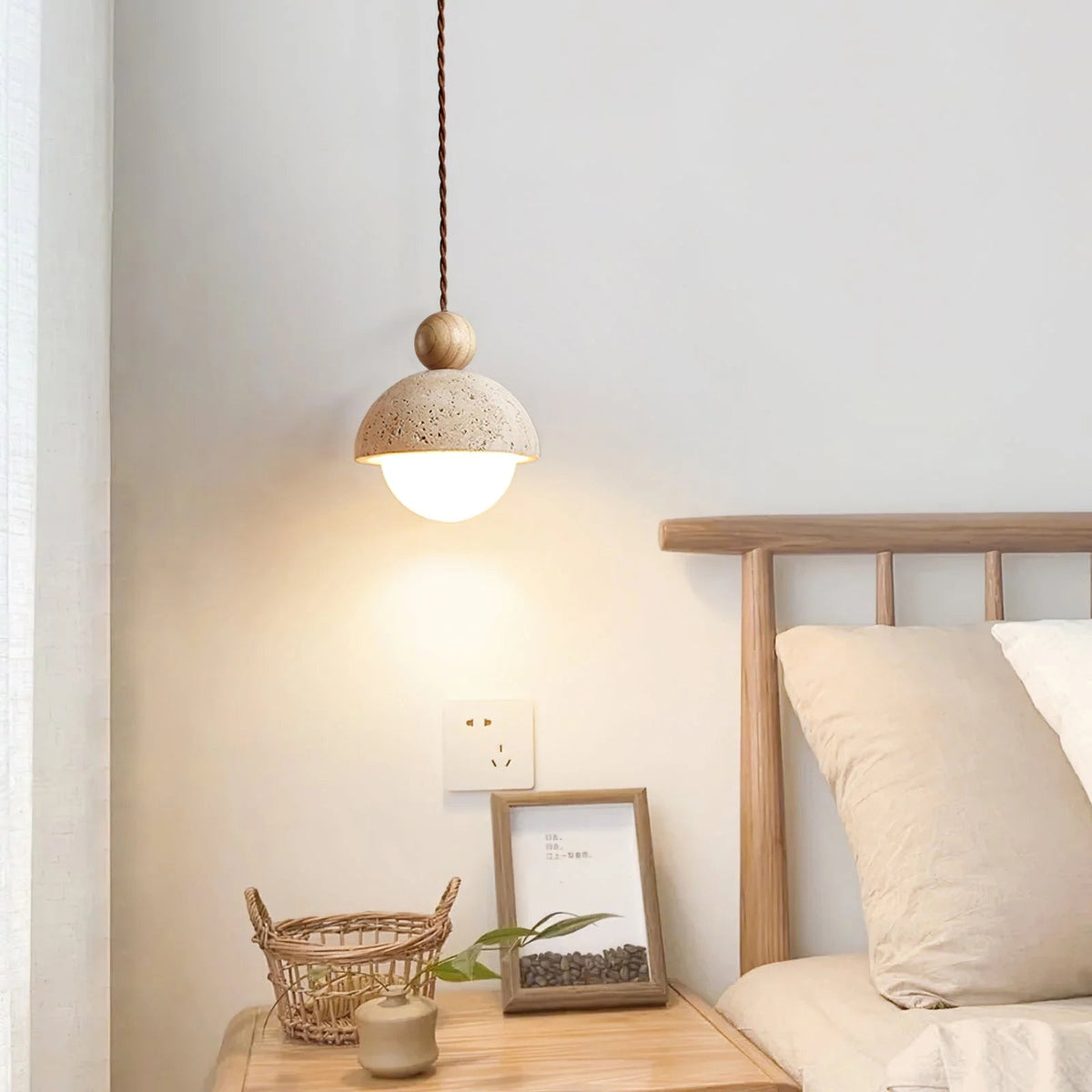 Travertine pendant light featuring a glass shade and wood accent, ideal for modern kitchen lighting over an island or dining table. 3