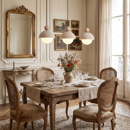 Travertine pendant light featuring a glass shade and wood accent, ideal for modern kitchen lighting over an island or dining table. 8