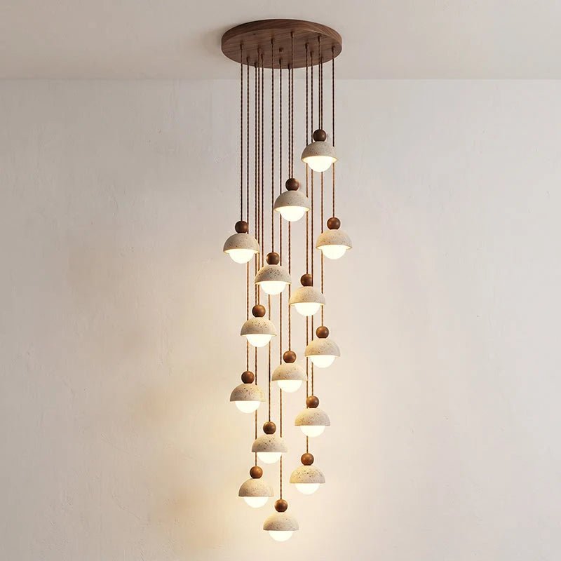 Travertine pendant light featuring a glass shade and wood accent, ideal for modern kitchen lighting over an island or dining table. 18