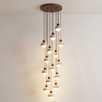 Travertine pendant light featuring a glass shade and wood accent, ideal for modern kitchen lighting over an island or dining table. 18