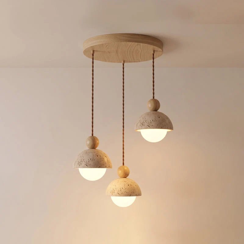 Travertine pendant light featuring a glass shade and wood accent, ideal for modern kitchen lighting over an island or dining table. 14
