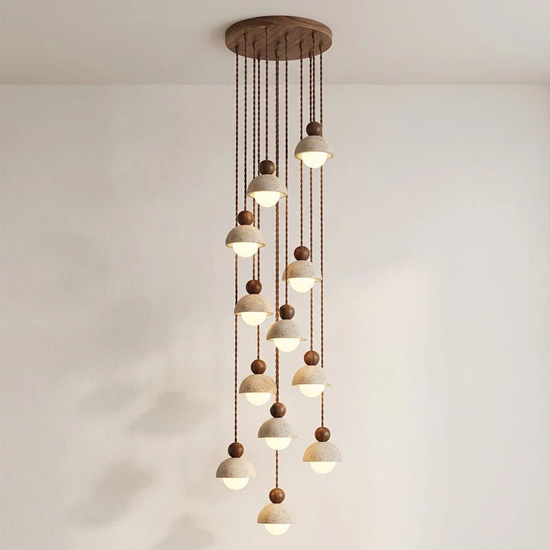 Travertine pendant light featuring a glass shade and wood accent, ideal for modern kitchen lighting over an island or dining table. 13