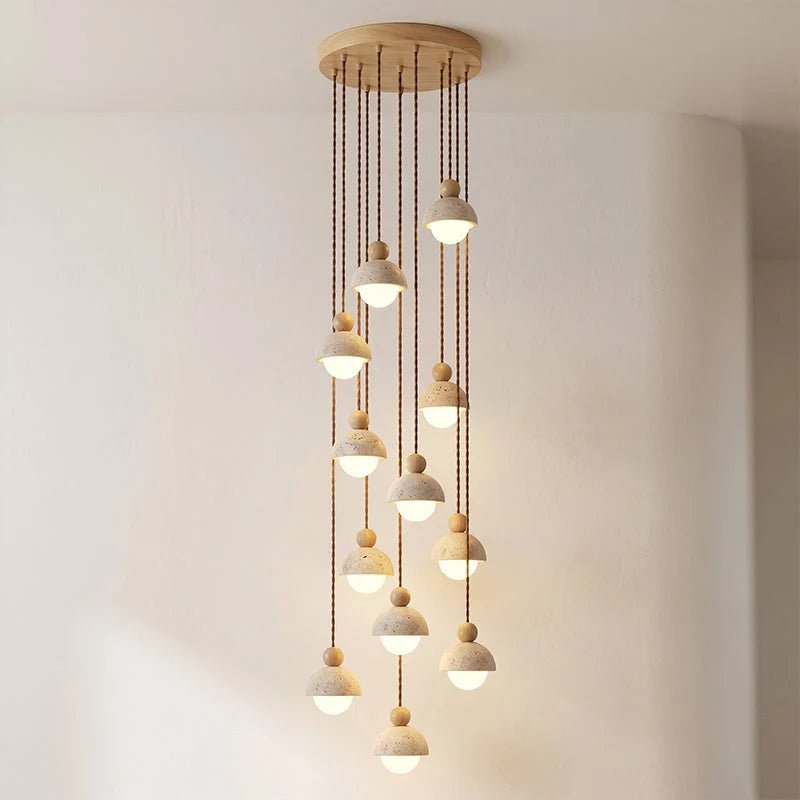 Travertine pendant light featuring a glass shade and wood accent, ideal for modern kitchen lighting over an island or dining table. 22