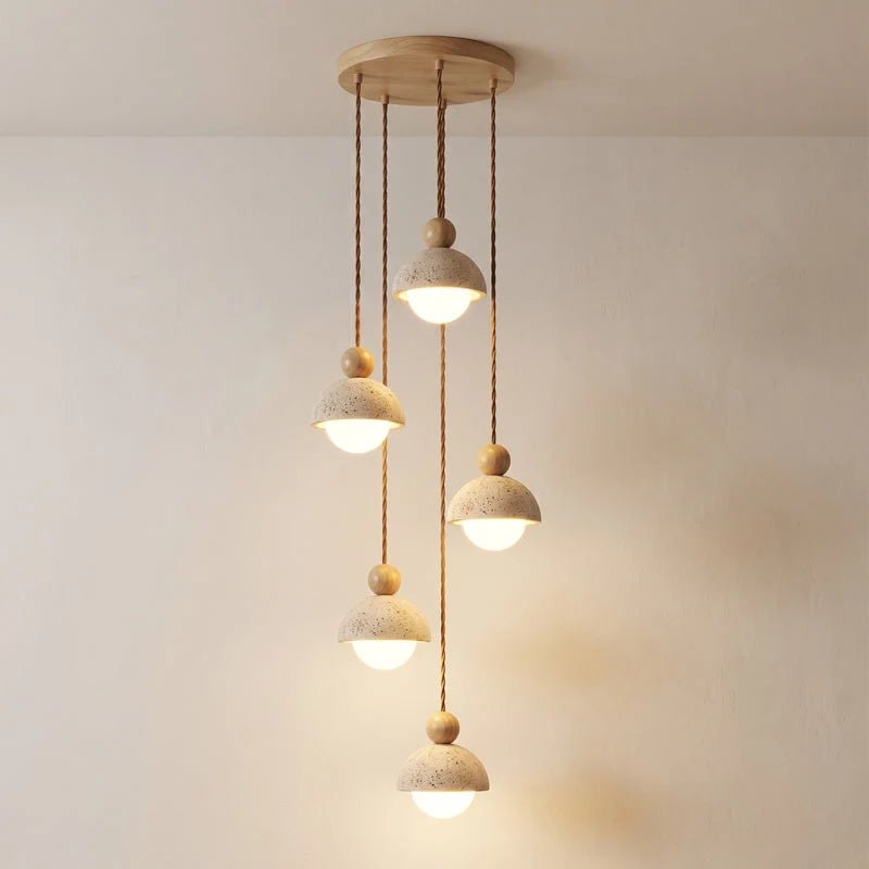 Travertine pendant light featuring a glass shade and wood accent, ideal for modern kitchen lighting over an island or dining table. 17
