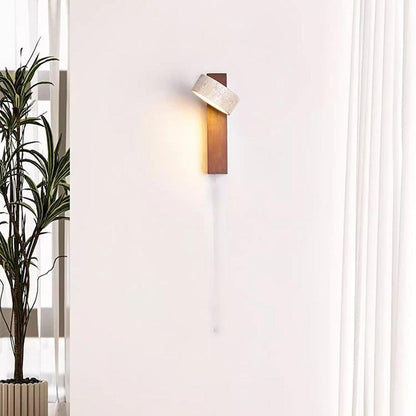 Travertine wall lamp featuring a swivel LED design with a minimalist stone and wood aesthetic, emitting a soft ivory light for elegant home decor. 4