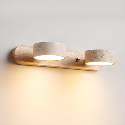 Travertine wall light with integrated LED, showcasing a warm ambient glow, ideal for bathroom and hallway decor, featuring a natural stone design. 12