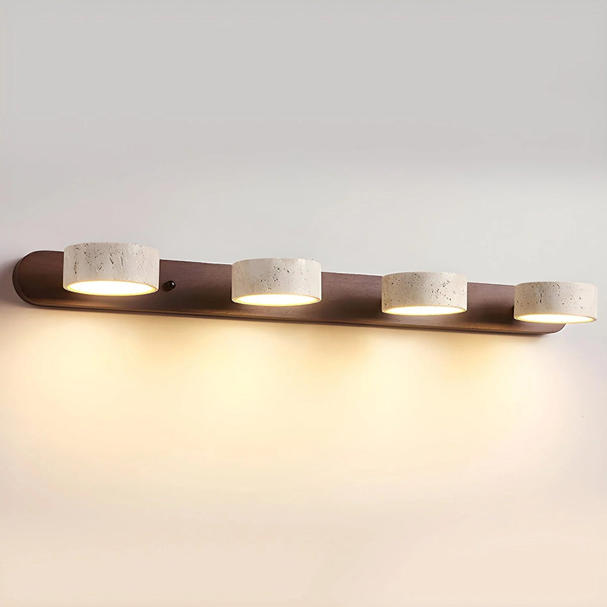 Travertine wall light with integrated LED, showcasing a warm ambient glow, ideal for bathroom and hallway decor, featuring a natural stone design. 13