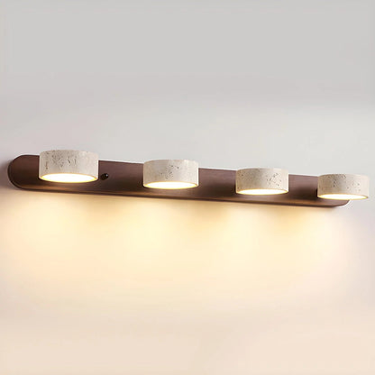 Travertine wall light with integrated LED, showcasing a warm ambient glow, ideal for bathroom and hallway decor, featuring a natural stone design. 13