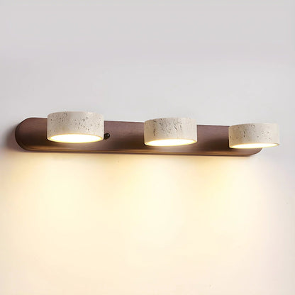 Travertine wall light with integrated LED, showcasing a warm ambient glow, ideal for bathroom and hallway decor, featuring a natural stone design. 14