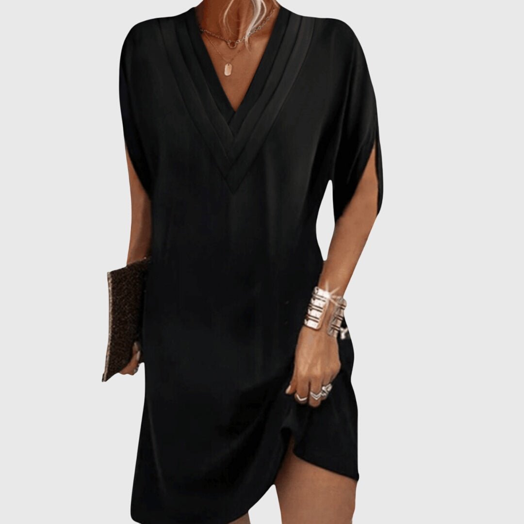 Elegant summer midi dress for women featuring a flattering V-neckline and a tummy-hiding design, perfect for stylish and comfortable outings. 1