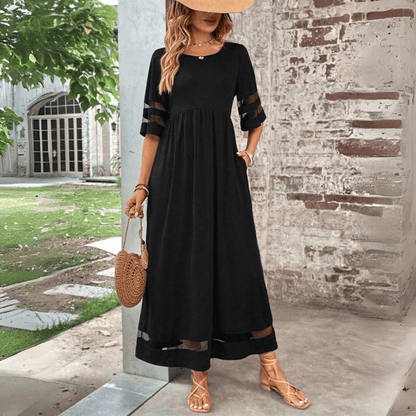 Tummy-smoothing midi dress featuring an empire waist and flowing skirt, designed for women with long sleeves in a classic white color. 0