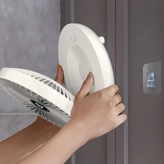 USB desk fan with three speed settings, featuring a foldable design for portability, ideal for home or travel use. 3