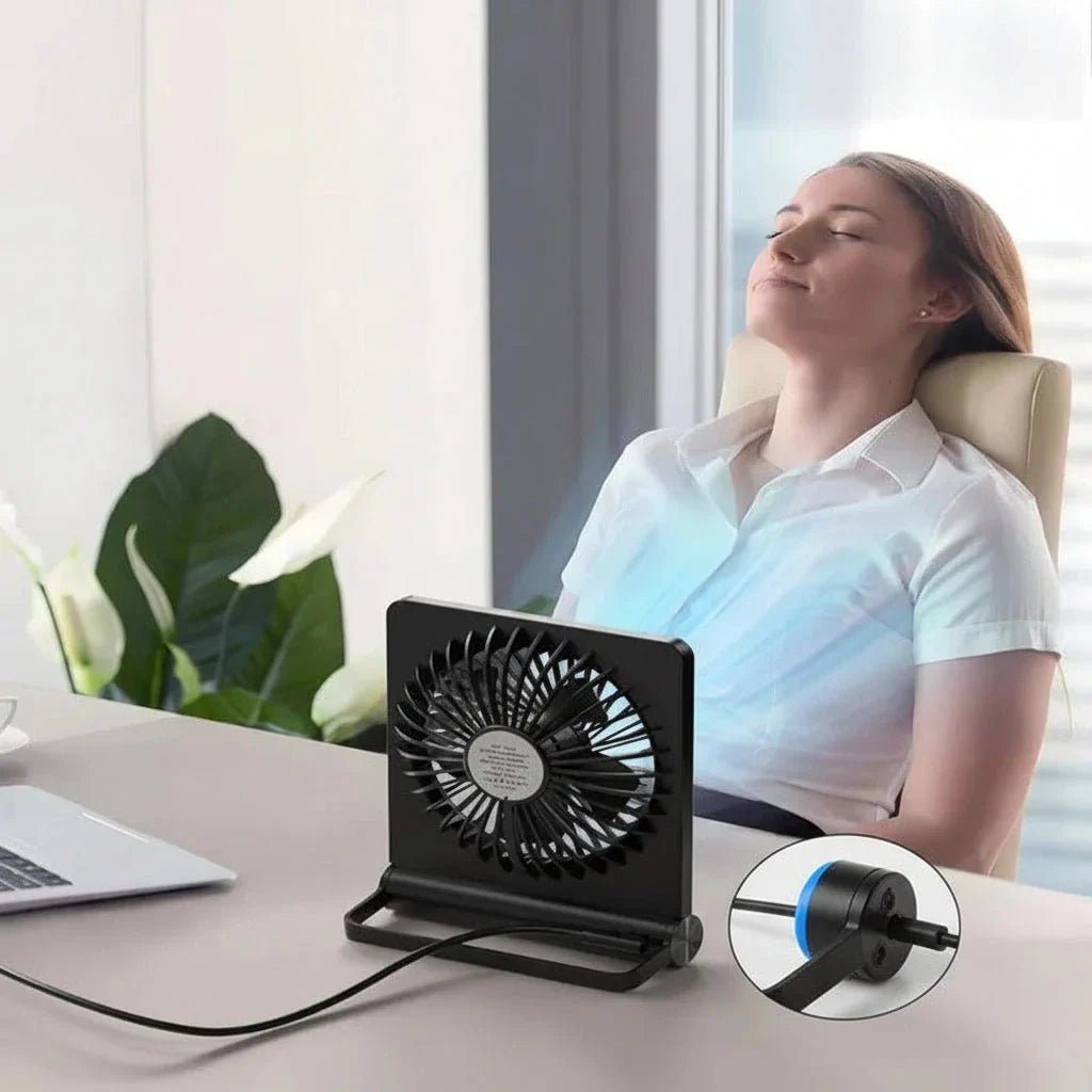 USB desk fan featuring adjustable airflow, compact portable design ideal for small spaces, perfect for home or office use. 1