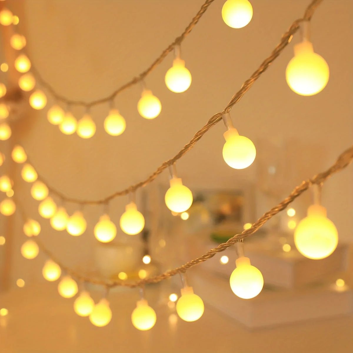 USB Globe Fairy Lights featuring a decorative globe shape, available in two vibrant colors and multiple lengths, perfect for adding a whimsical touch to any space. 1