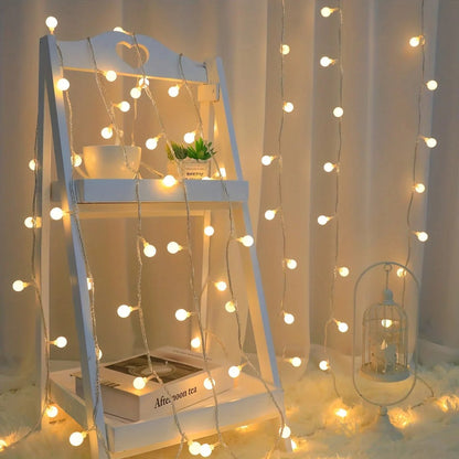 USB Globe Fairy Lights featuring a decorative globe shape, available in two vibrant colors and multiple lengths, perfect for adding a whimsical touch to any space. 2