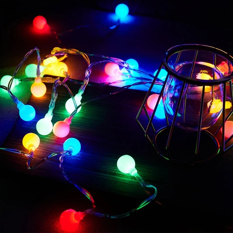 USB Globe Fairy Lights featuring a decorative globe shape, available in two vibrant colors and multiple lengths, perfect for adding a whimsical touch to any space. 4