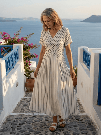 V Neck Midi Dress for Women featuring Soft Drape Fabric and Cross Waist Detail, perfect for Summer Wedding Guests. 1
