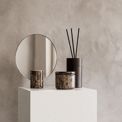 Vanity mirror with a frameless design and natural marble base, showcasing an elegant freestanding accent for modern home decor. 4