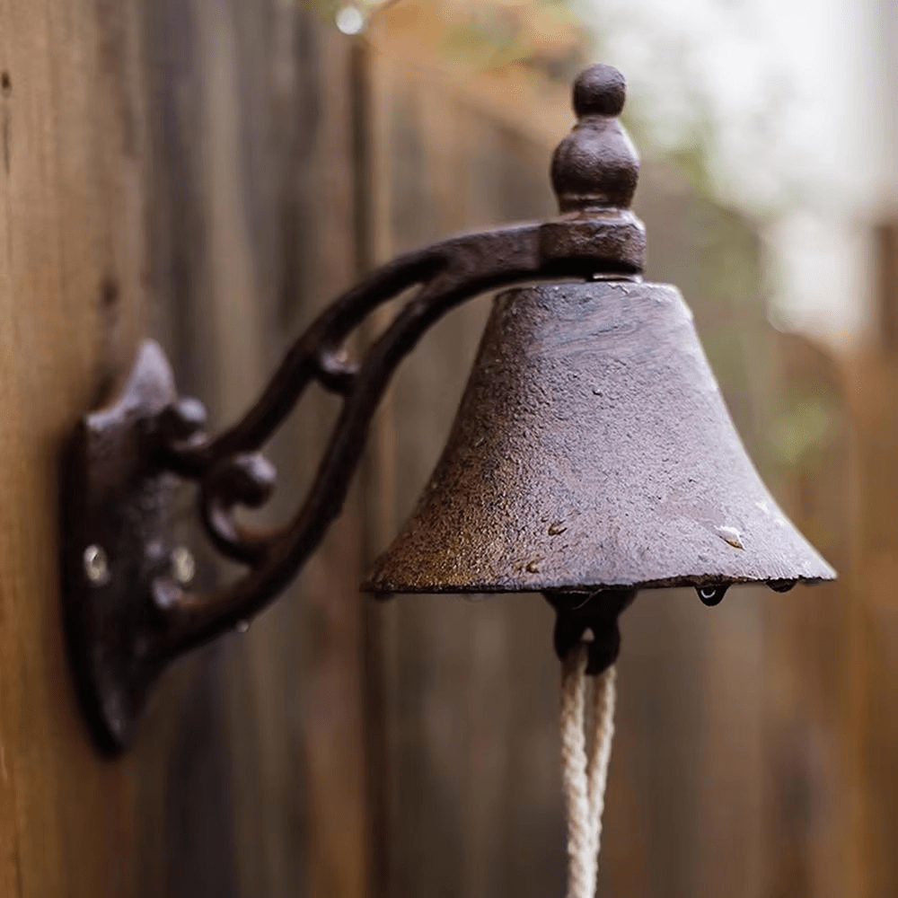Vintage cast iron doorbell featuring a durable design and timeless elegance, showcasing classic European style with intricate detailing and a rustic finish. 0