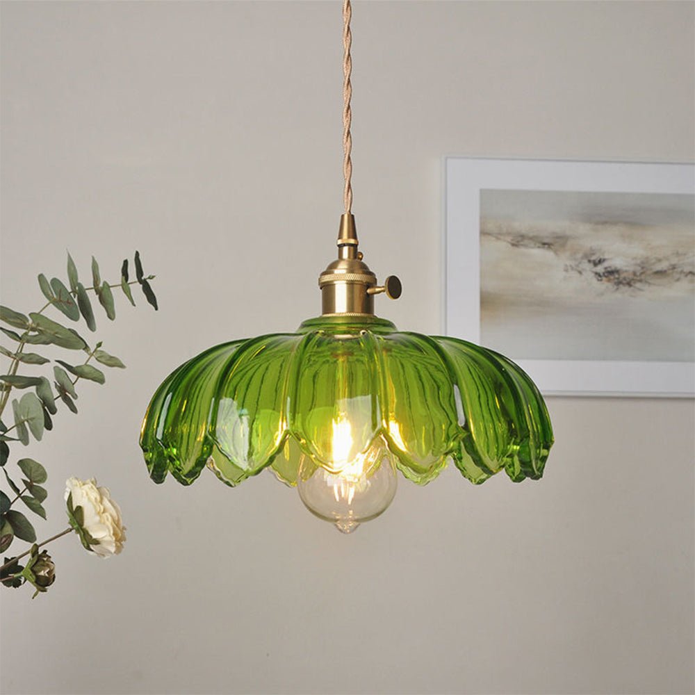 Vintage glass pendant light with a stylish copper finish, designed to provide soft ambient illumination for kitchen islands, enhancing rustic and modern decor. 1