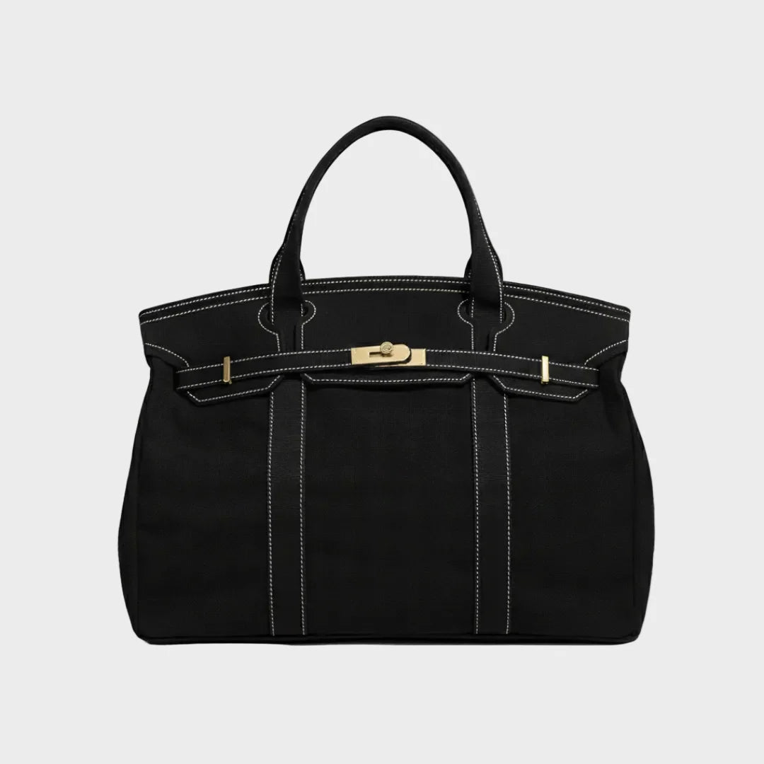 Vintage linen canvas tote bag featuring reinforced handles and a secure snap closure, perfect for stylish and eco-friendly shopping or daily use. 6