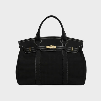 Vintage linen canvas tote bag featuring reinforced handles and a secure snap closure, perfect for stylish and eco-friendly shopping or daily use. 6