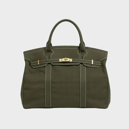 Vintage linen canvas tote bag featuring reinforced handles and a secure snap closure, perfect for stylish and eco-friendly shopping or daily use. 7